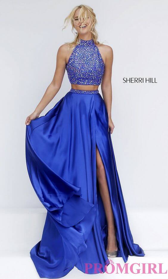 Girl in electric blue two piece gown with beaded top.